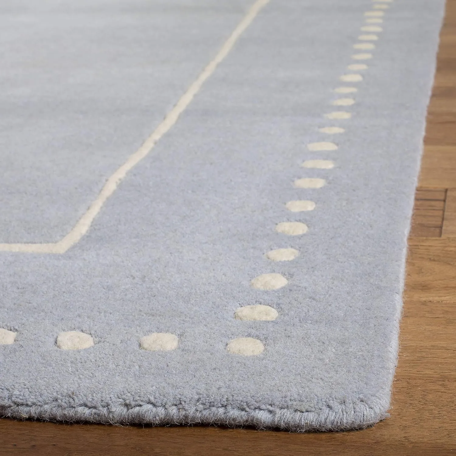 SAFAVIEH Bella Collection Area Rug - 9' x 12', Light Blue & Ivory, Handmade Dotted Border Wool, Ideal for High Traffic Areas in Living Room, Bedroom (BEL151A)