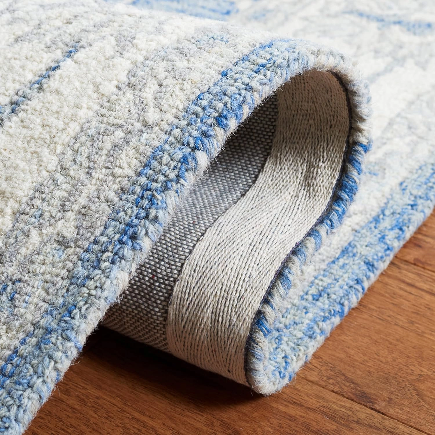 SAFAVIEH Micro-Loop Collection Area Rug - 9' x 12', Blue & Ivory, Handmade Wool, Ideal for High Traffic Areas in Living Room, Bedroom (MLP536M)