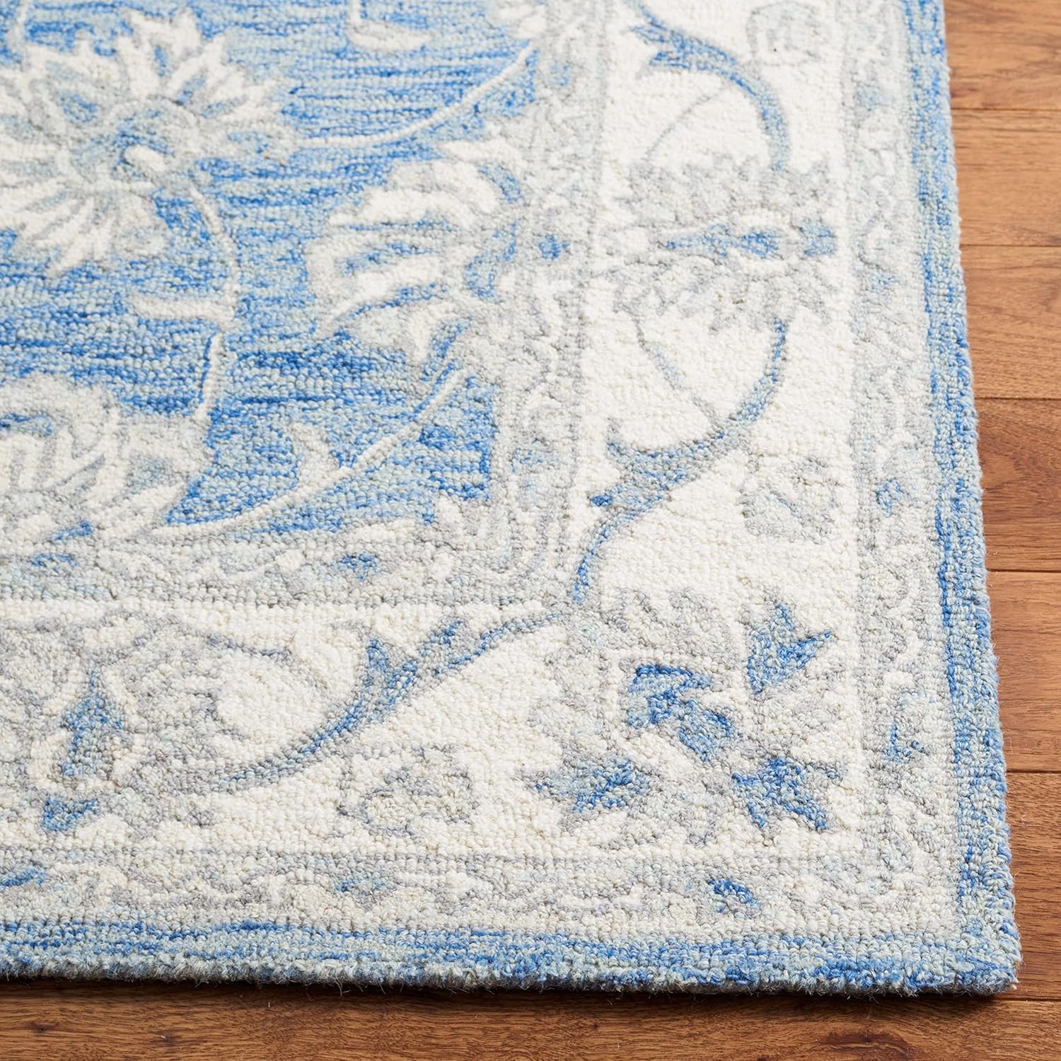SAFAVIEH Micro-Loop Collection Area Rug - 9' x 12', Blue & Ivory, Handmade Wool, Ideal for High Traffic Areas in Living Room, Bedroom (MLP536M)