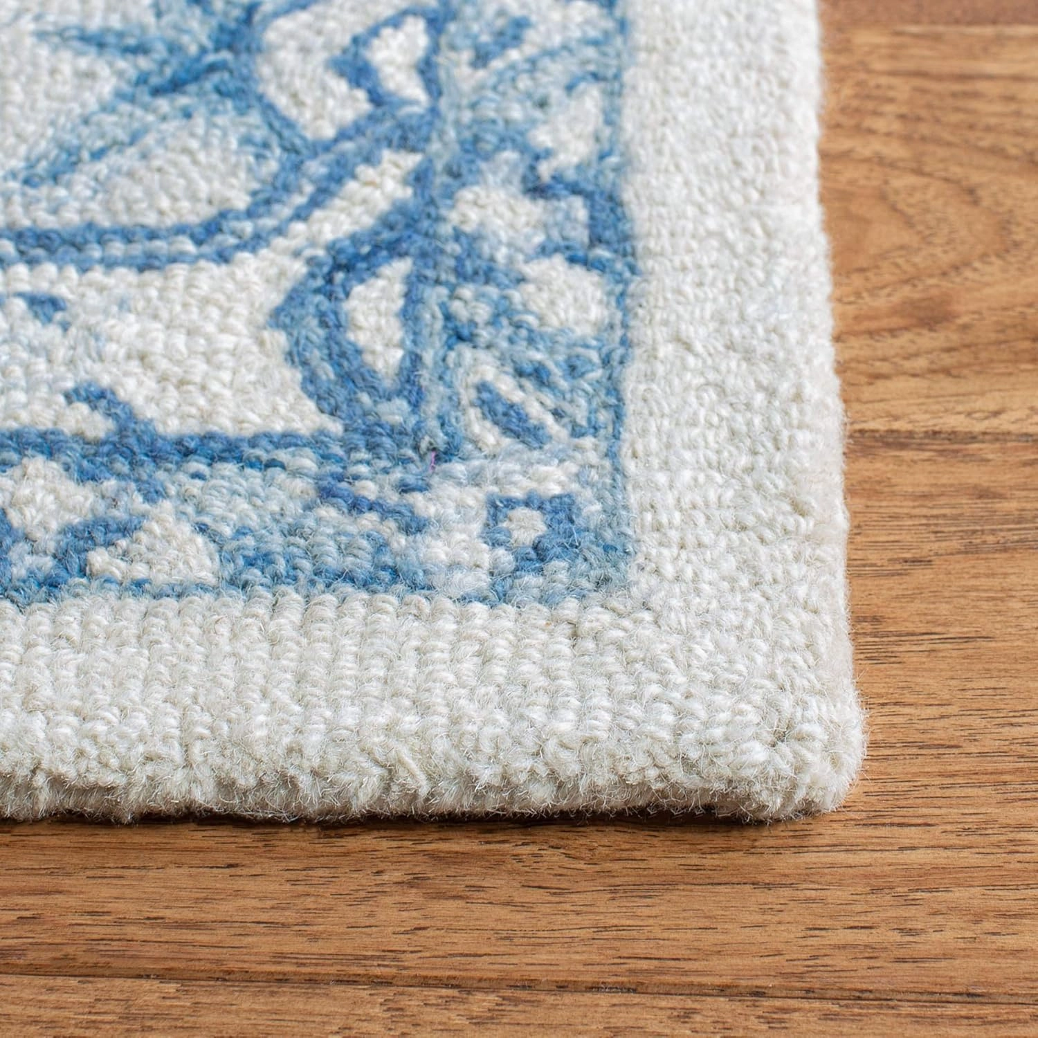 SAFAVIEH Micro-Loop Collection Area Rug - 9' x 12', Ivory & Blue, Handmade Shabby Chic Medallion Wool, Ideal for High Traffic Areas in Living Room, Bedroom (MLP503G)