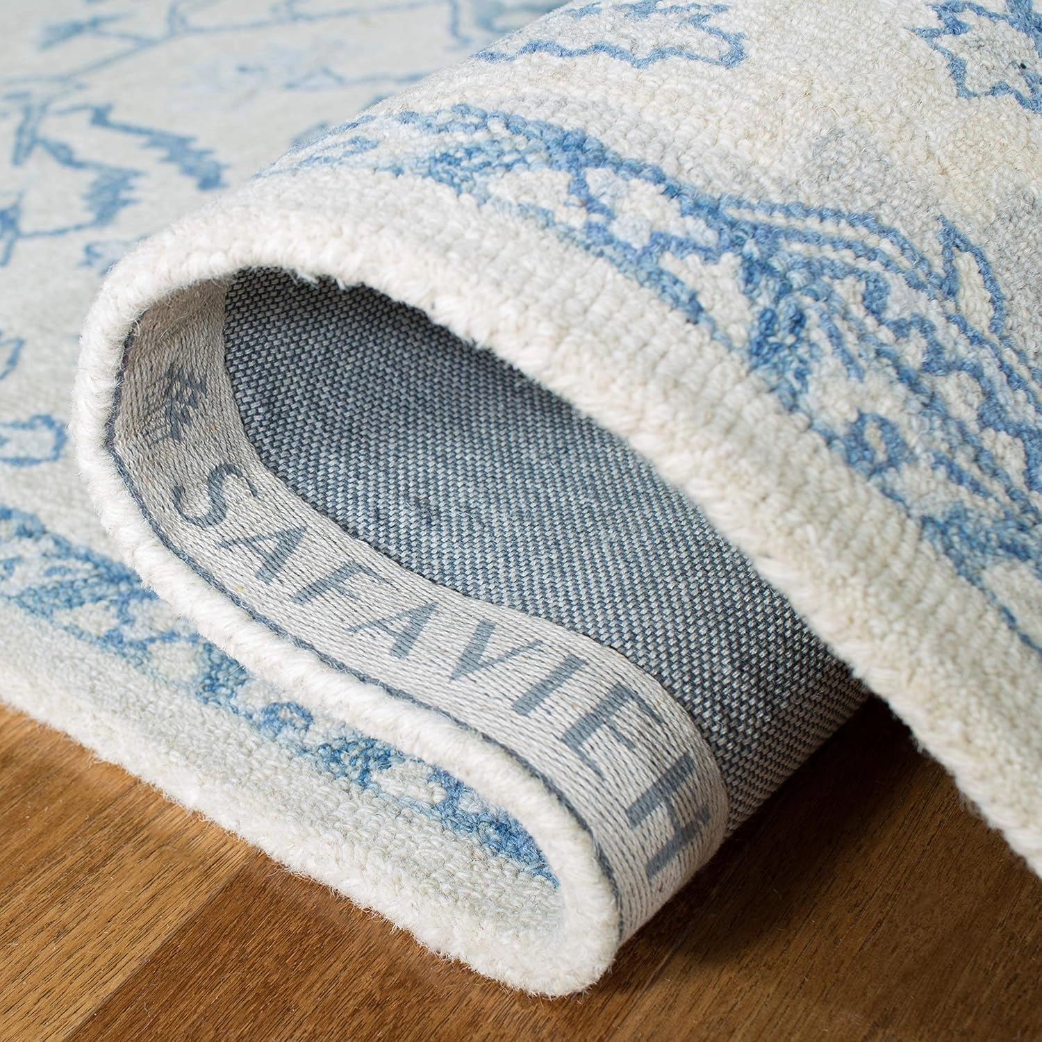 SAFAVIEH Micro-Loop Collection Area Rug - 9' x 12', Ivory & Blue, Handmade Shabby Chic Medallion Wool, Ideal for High Traffic Areas in Living Room, Bedroom (MLP503G)