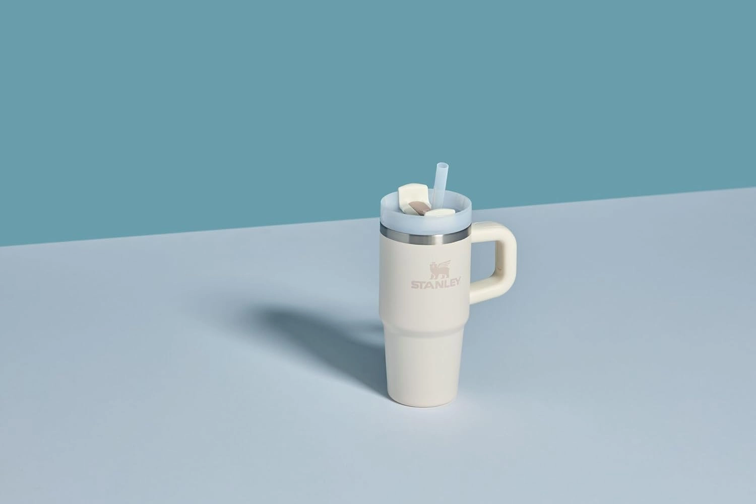 Stanley Quencher H2.0 Tumbler with Handle and Straw 20 oz | Flowstate 3-Position Lid | Cup Holder Compatible for Travel | Insulated Stainless Steel Cup | BPA-Free | Cream 2.0