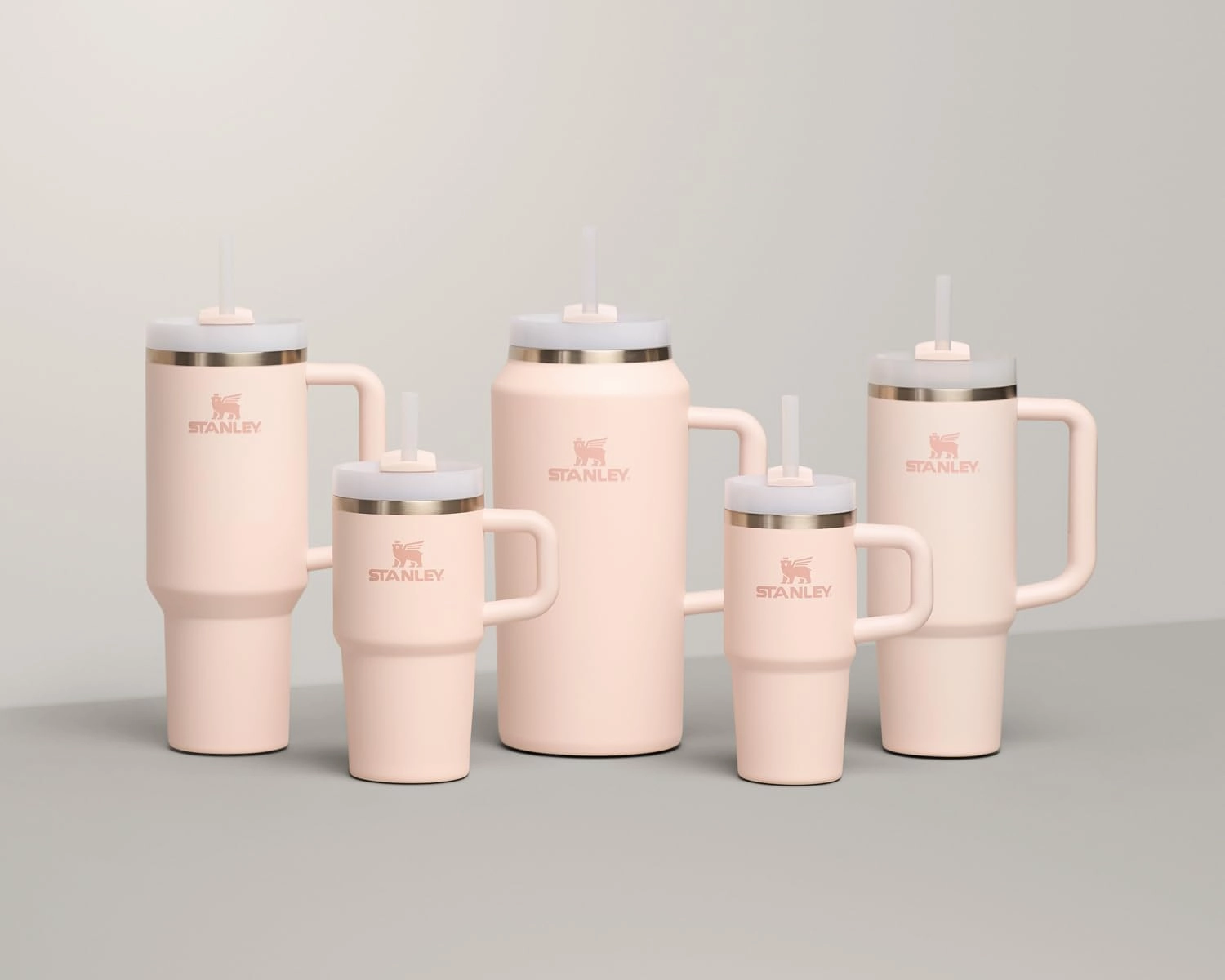 Stanley Quencher H2.0 Tumbler with Handle and Straw 30 oz | Flowstate 3-Position Lid | Cup Holder Compatible for Travel | Insulated Stainless Steel Cup | BPA-Free | Rose Quartz 2.0